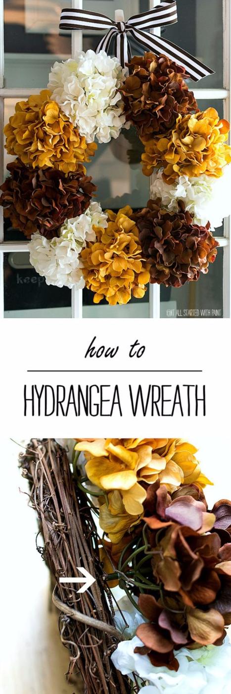 Dried hydrangea wreath in soft antique tones hanging on a white front door, a gentle autumn door wreath