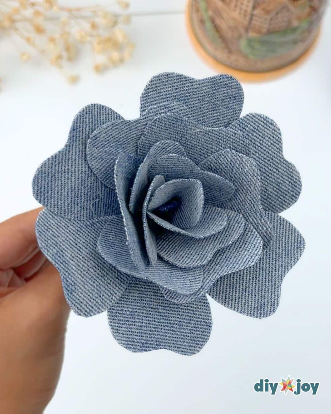 Denim Roses From Old Jeans — add the last stack of petals