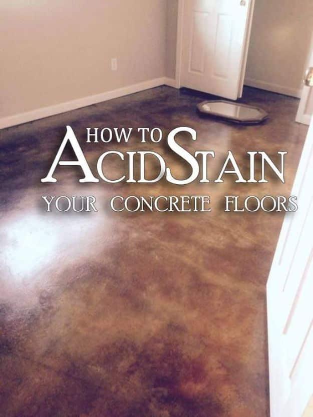 Acid stained concrete floor, a mottled brown and amber stained slab running through a doorway in a bare room