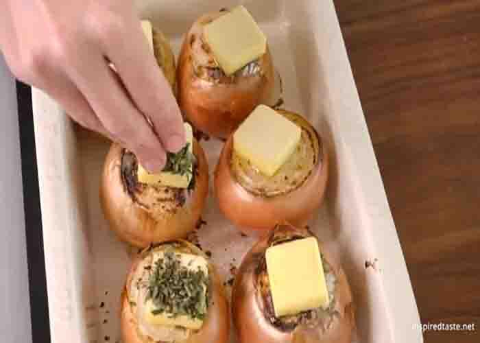 Seasoning the onions before roasting them