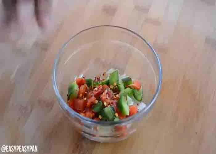 Mixing the pizza toast toppings
