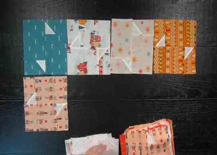 Laying out the flurries quilt