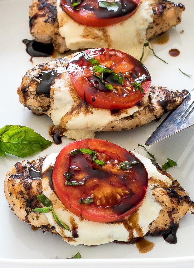 Grilled chicken caprese with melted mozzarella, tomato slices, torn basil and a dark balsamic drizzle