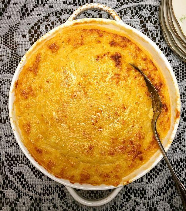 Southern cheese grits casserole baked golden with sharp cheddar and parmesan, served as a brunch side dish