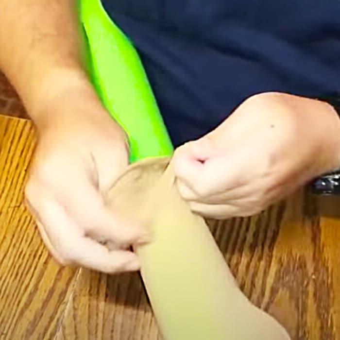Fix A Door Draft Using Pantyhose - Fix A Door Draft Using A Pool Noodle - Pool Noodle Household Hacks