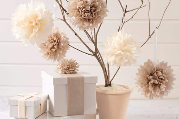 Tissue Paper Pom Poms, cheap to pull off with items from a bargain aisle and the kind of upgrade neighbors notice right away