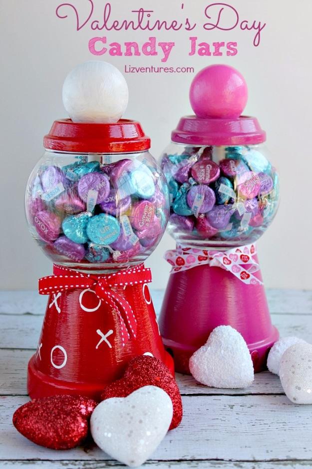 Three clear jars filled with candy sorted by color into red pink and white for Valentine's Day for Valentine's Day