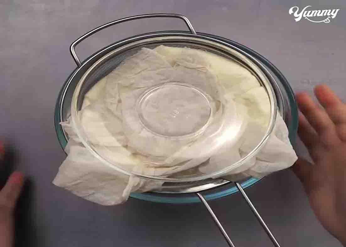 Straining the yogurt to remove all the liquid