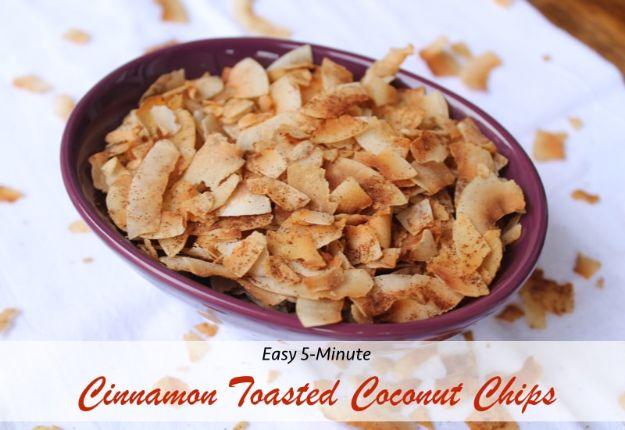 Toasted coconut chips in a deep maroon oval bowl over the words Easy 5-Minute Cinnamon Toasted Coconut Chips