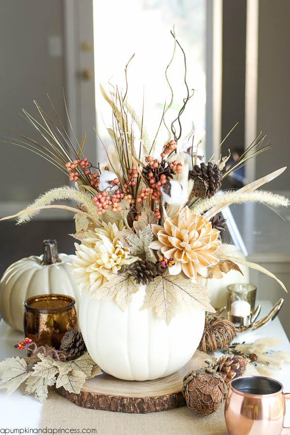 DIY Thanksgiving decor pumpkin vase made from a faux white pumpkin filled with pampas, dahlias and burlap leaves