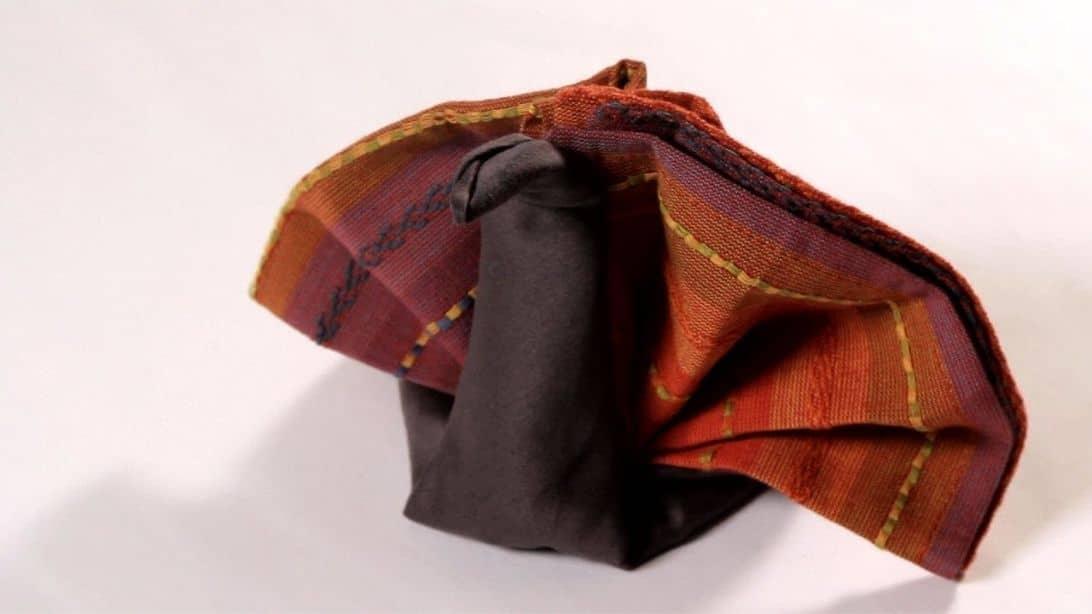 How to Fold A Napkin Into A Turkey
