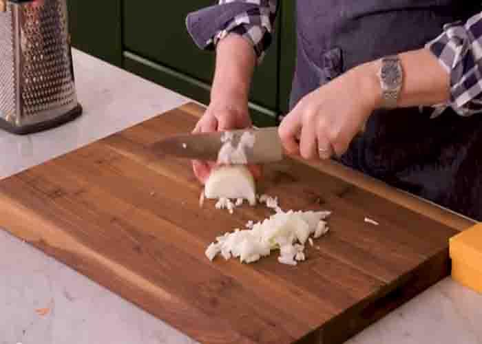 Chopping the onions for the hashbrown casserole recipe