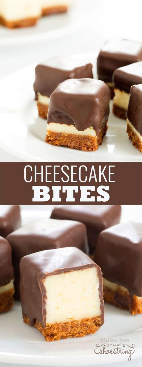 Gluten free cheesecake bites dipped in dark chocolate and arranged on parchment paper in neat even rows