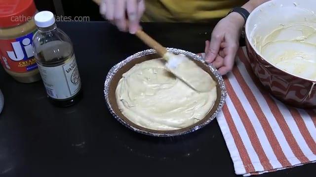 Assembling the peanut butter chocolate pie