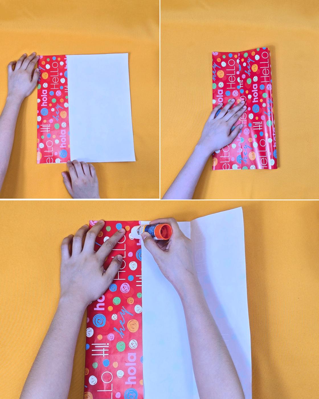 How to Make a Gift Bag - folding the edge of red print wrapping paper over a white backing sheet and gluing the seam