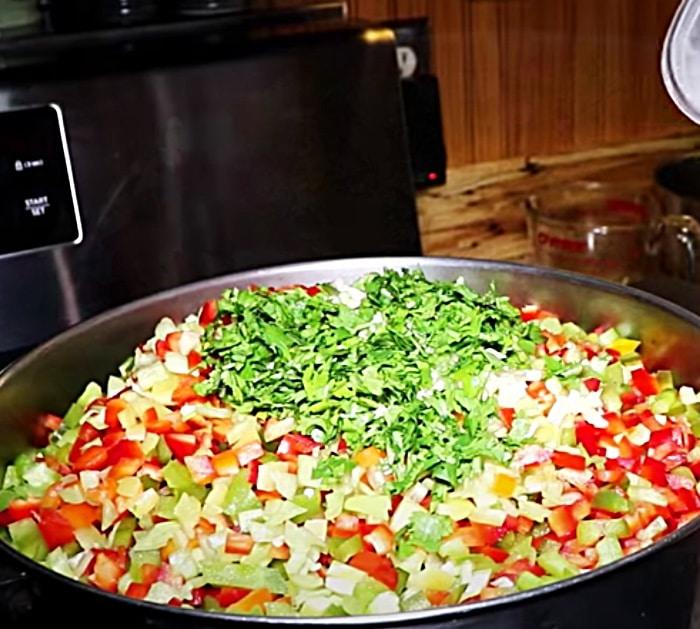 Cut Tomatoes And Peppers To Make Homemade Salsa