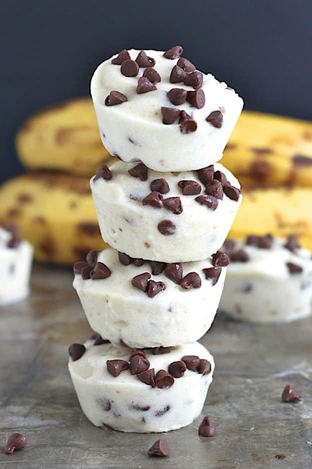 Two ingredient banana chocolate chip ice cream bites frozen in a mini muffin pan for summer treat, straight from the freezer