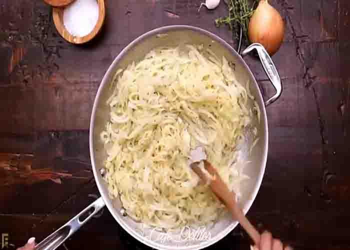 Making the French onion sauce for the stuffed chicken