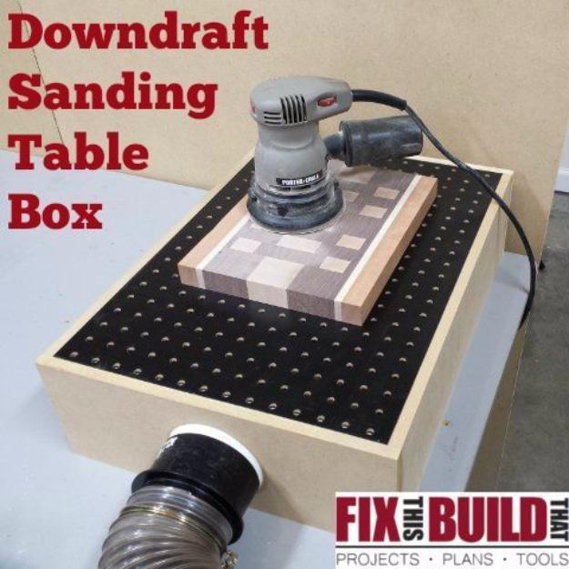 Titled graphic DIY Downdraft Sanding Table Box showing the pegboard topped box, an orbital sander and a dust hose