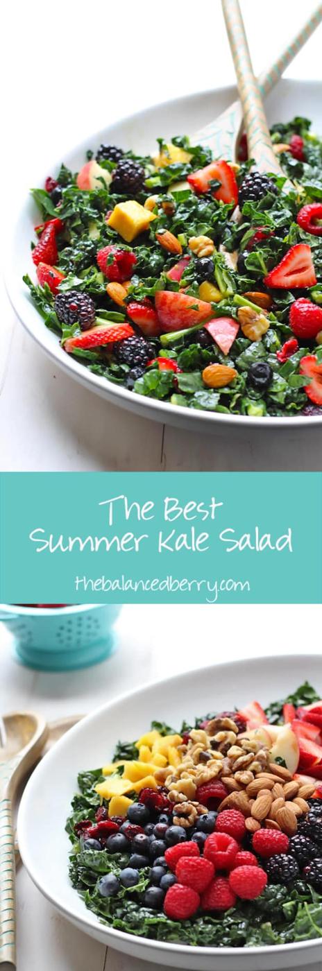Kale summer salad tossed with strawberries, blackberries, peach and mango with almonds and walnuts beside the grill