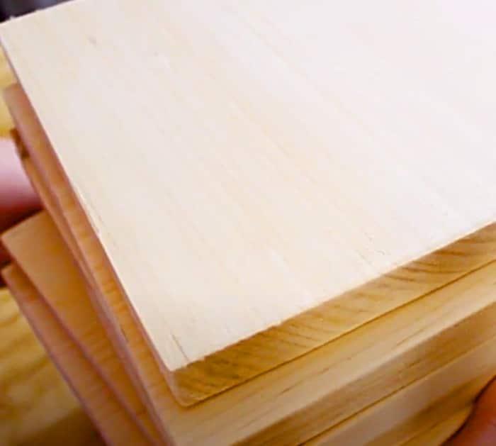 Cut some wooden squares for Scrabble wall art
