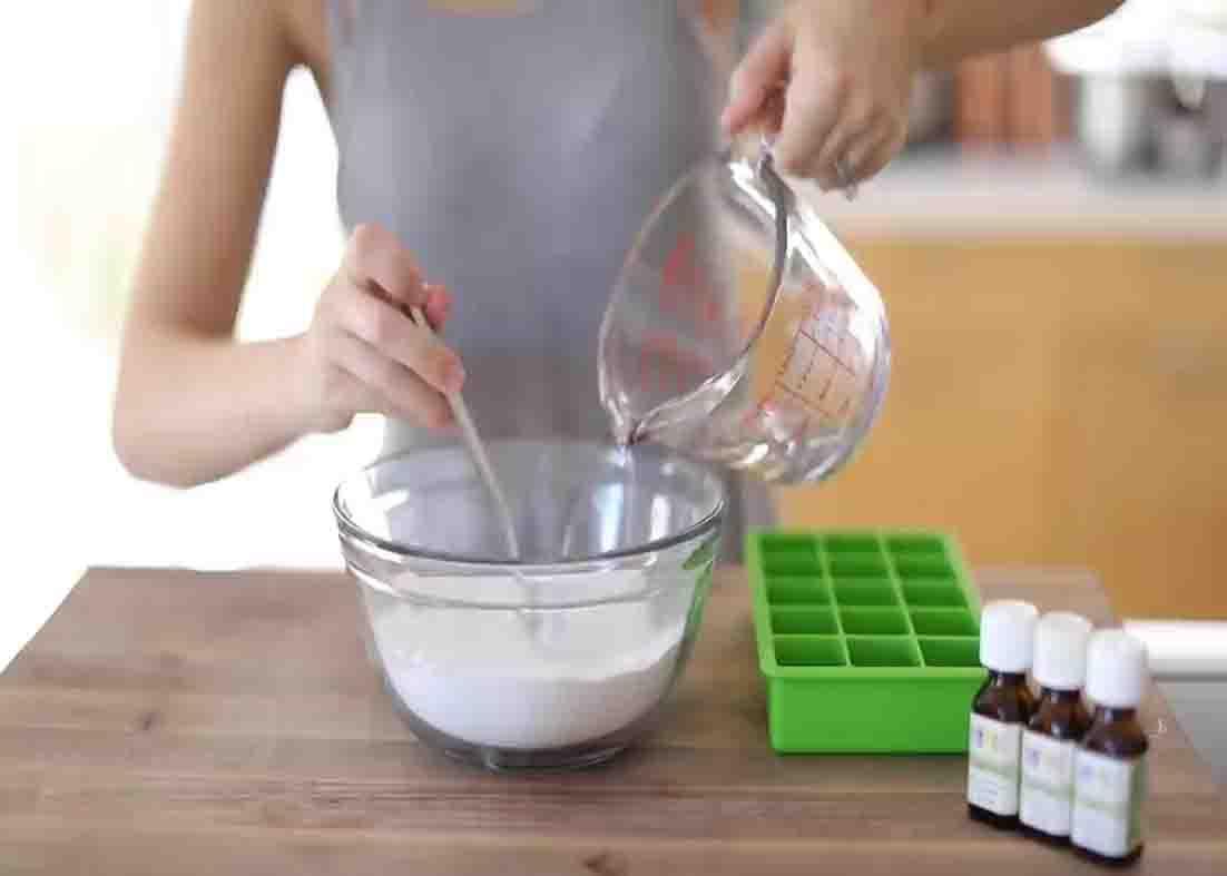 Combining the ingredients for the DIY toilet fizzies