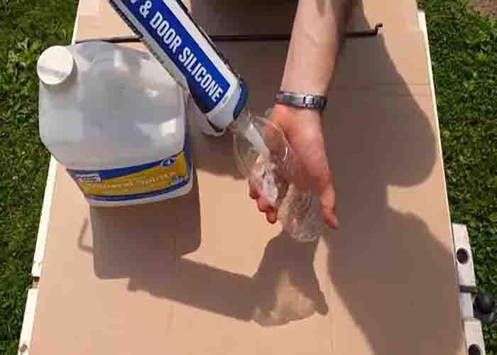 Mixing the ingredients to make the DIY waterproofing solution