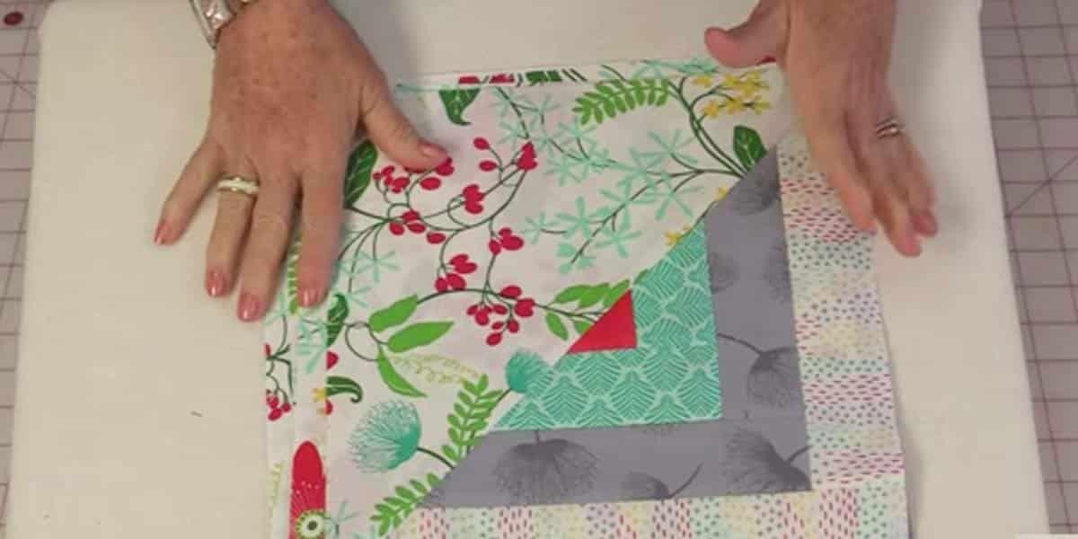 Piece A Half Of A Log Cabin Pattern And Half Of A Triangle To Make This Quilt