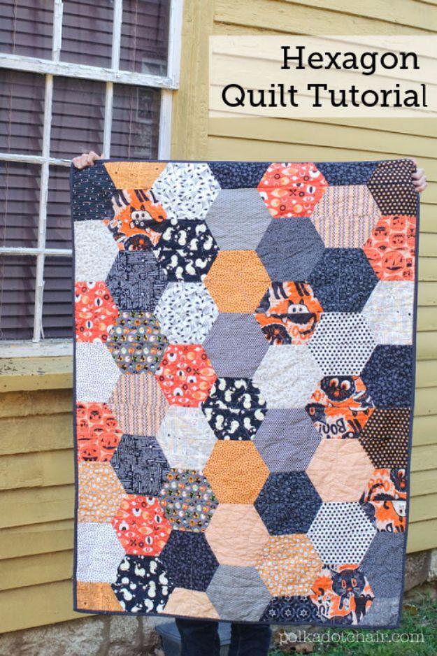 Hexagon quilt tutorial graphic, big orange, black and cream Halloween print hexagons held beside a yellow house