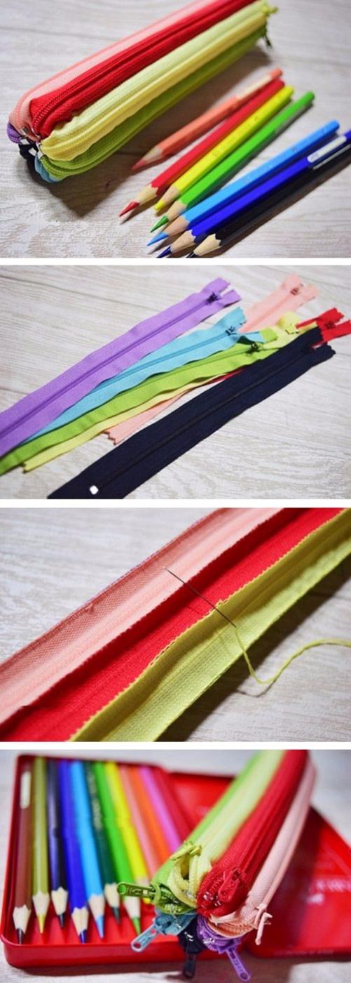 Rainbow zipper pencil case made from pink, red, yellow and green zippers sewn side by side beside colored pencils