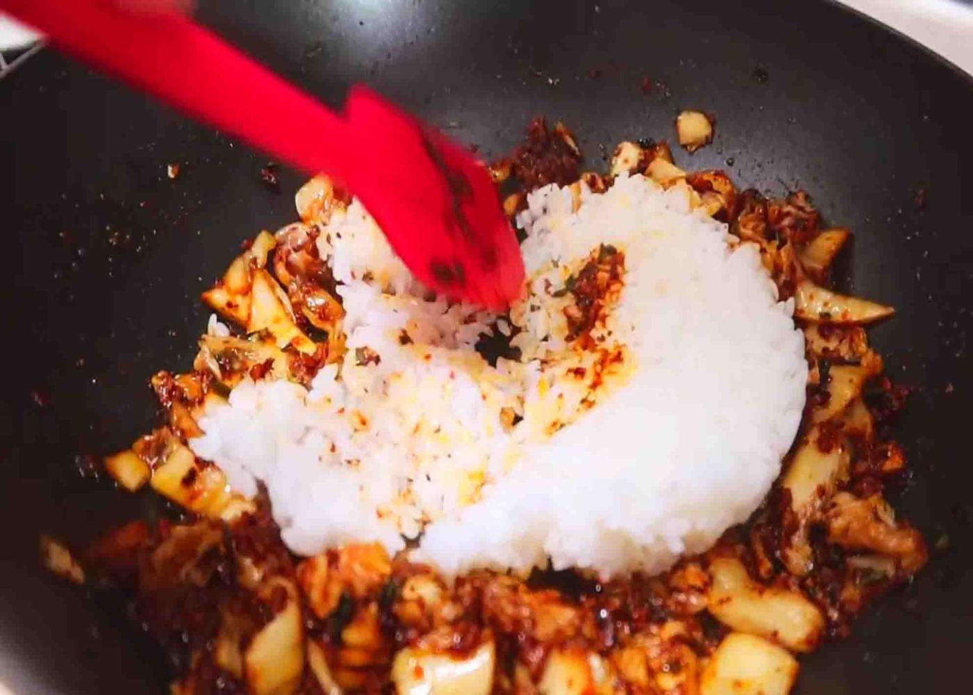 Cooking the kimchi fried rice