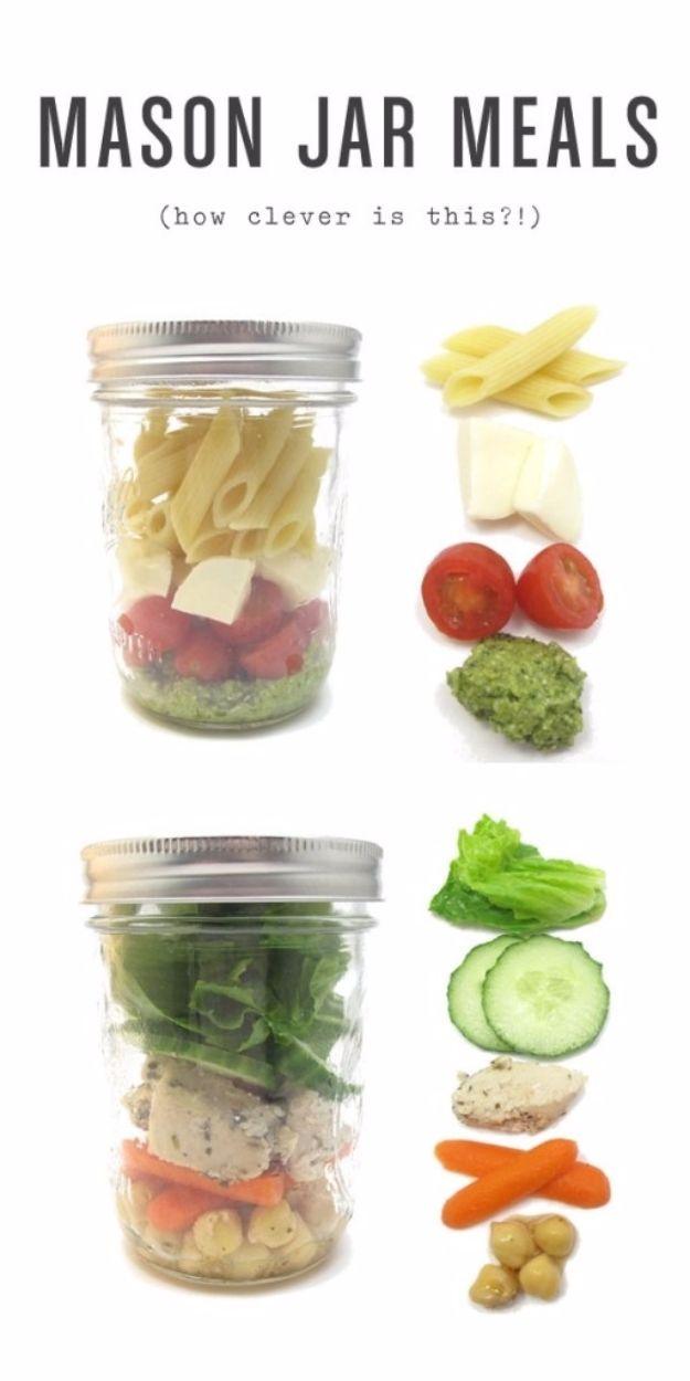 Mason jar picnic meals, two wide mouth jars layered with pasta salad and green salad beside the separate ingredients
