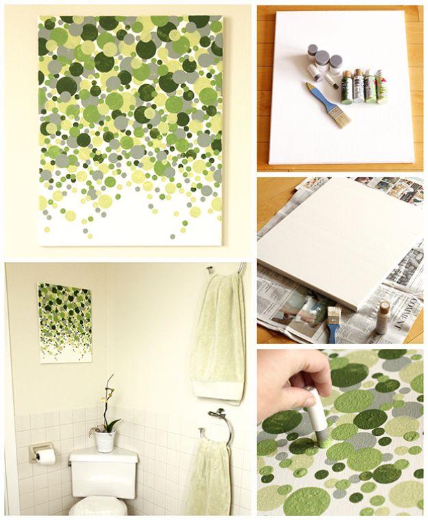 Canvas wall art of scattered green circles densest at the top, shown with build photos and paint tubes beside it