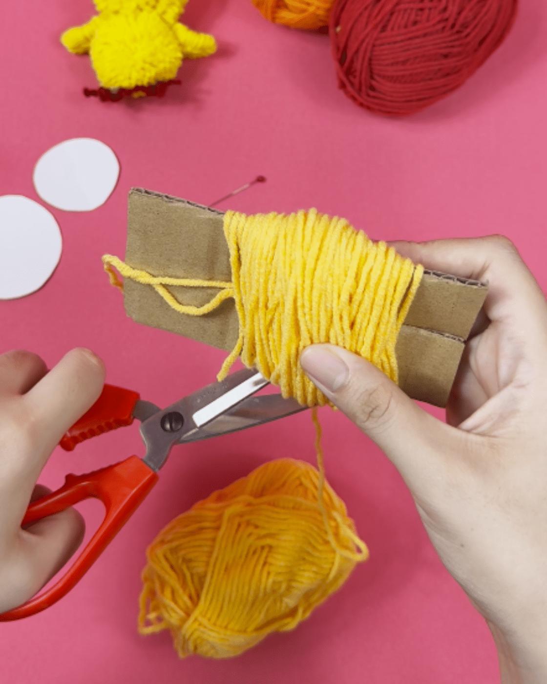 Yarn Chicks — adorable easter craft for kids