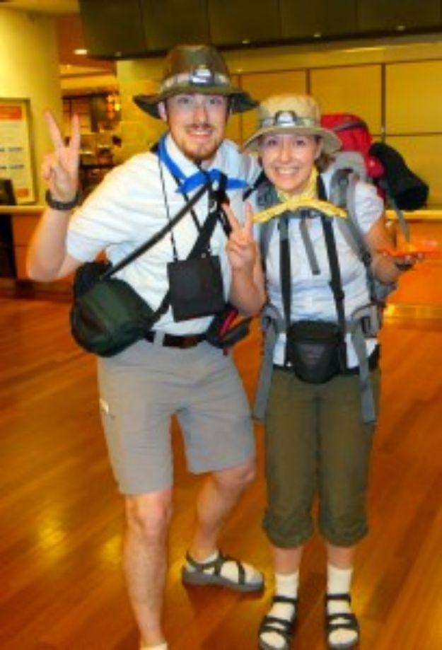 Tourist couples costume with wide brim hats, white polos, cargo shorts, fanny packs, cameras and a backpack