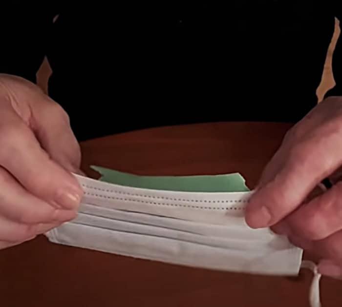 Put tape on a mask to stop glasses from fogging