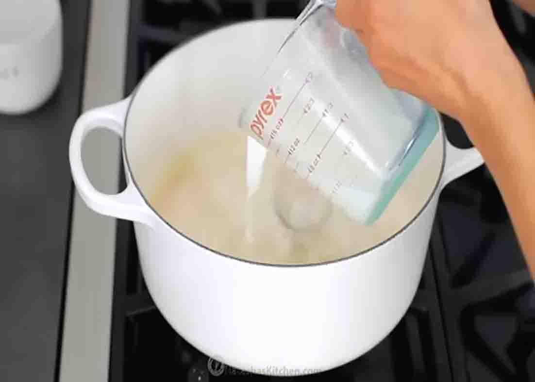 Making the sauce for the au gratin potatoes casserole