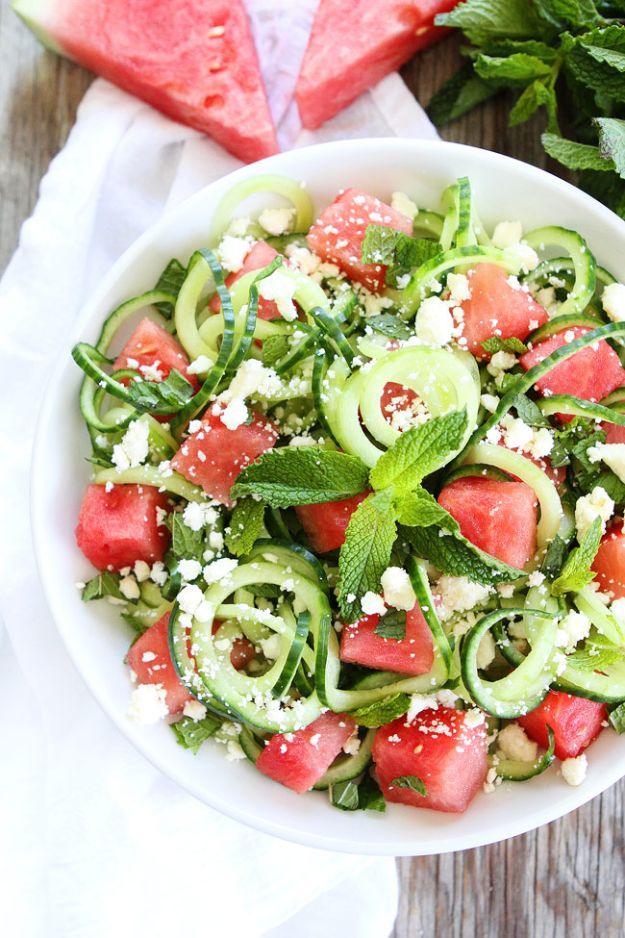 Cucumber noodle watermelon and feta salad tossed with fresh mint and lime, a cool summer side salad to serve straight away