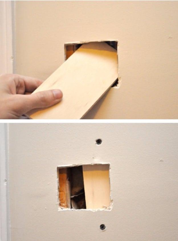 DIY home repair: a backer board being slid in behind a square cut drywall hole, and the hole with its screws in