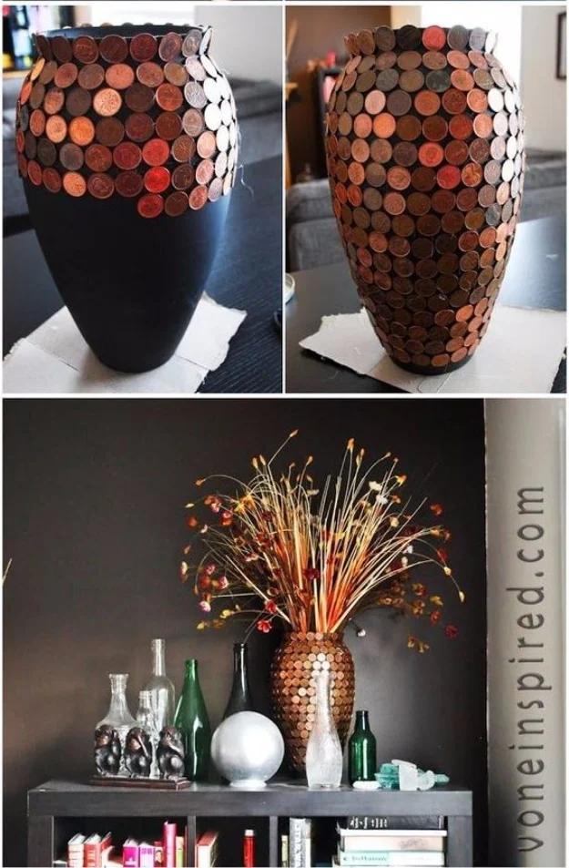 Penny vase in progress, copper coins covering a matte black urn, with the finished vase styled on a shelf