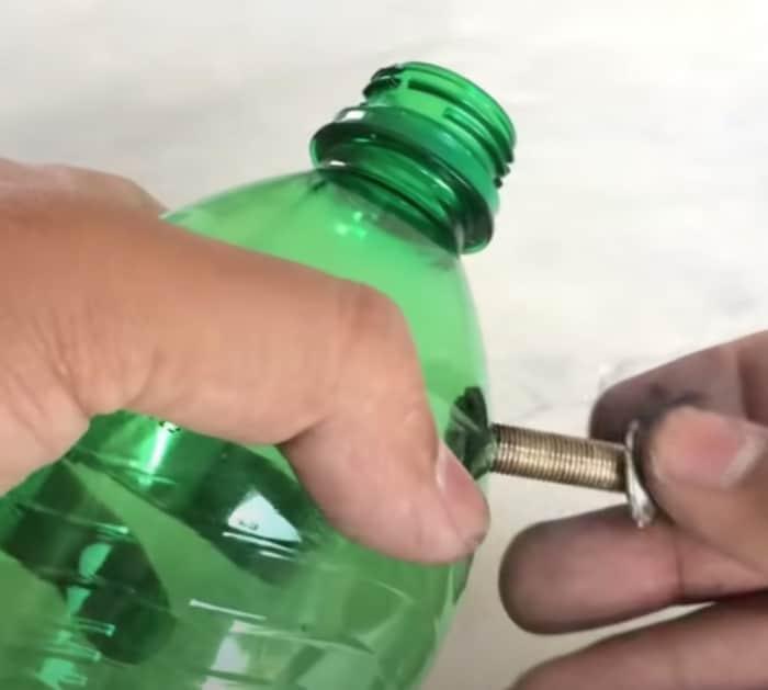Make a spray painter out of a soda bottle