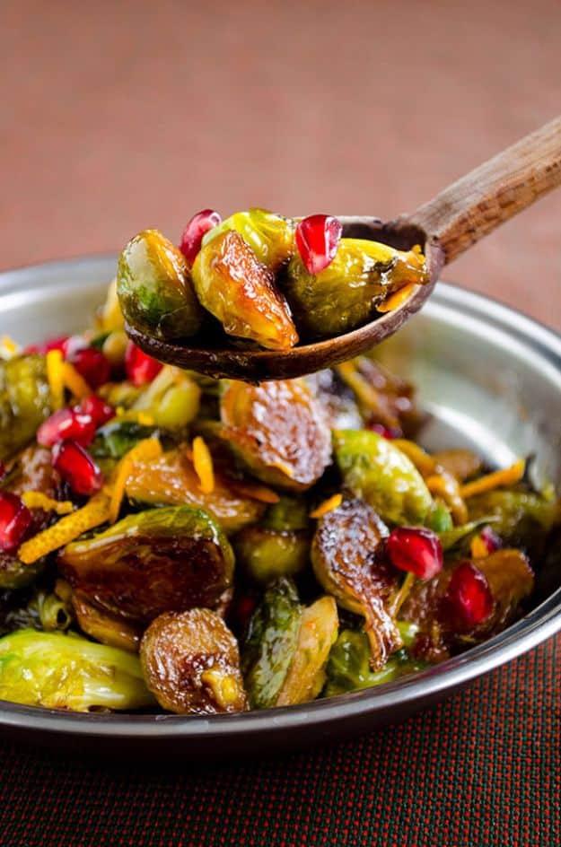 Citrus caramelized brussels sprouts glazed with orange and pomegranate molasses topped with pomegranate seeds