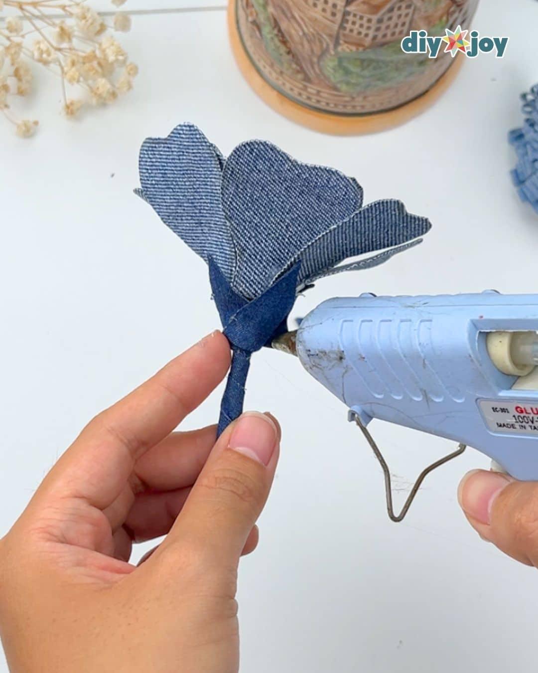 Homemade Denim Roses From Old Jeans — glue the triangles