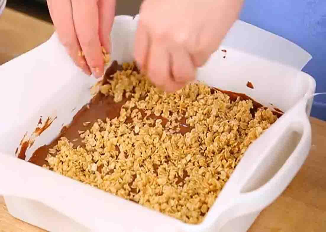 Assembling the chocolate peanut butter oat bars