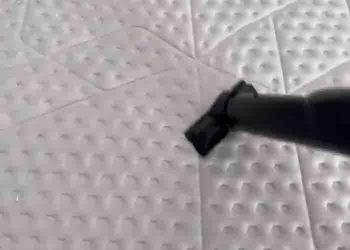 Removing the baking soda off the mattress using a vacuum