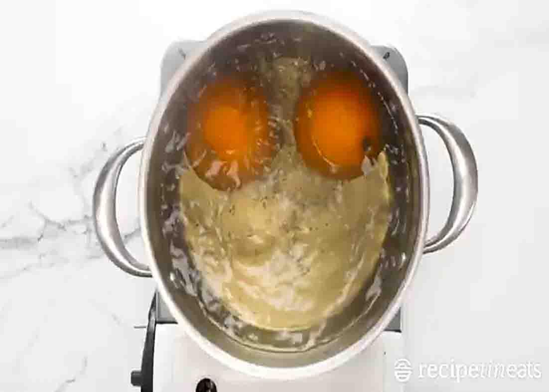 Boiling the oranges for the cake recipe