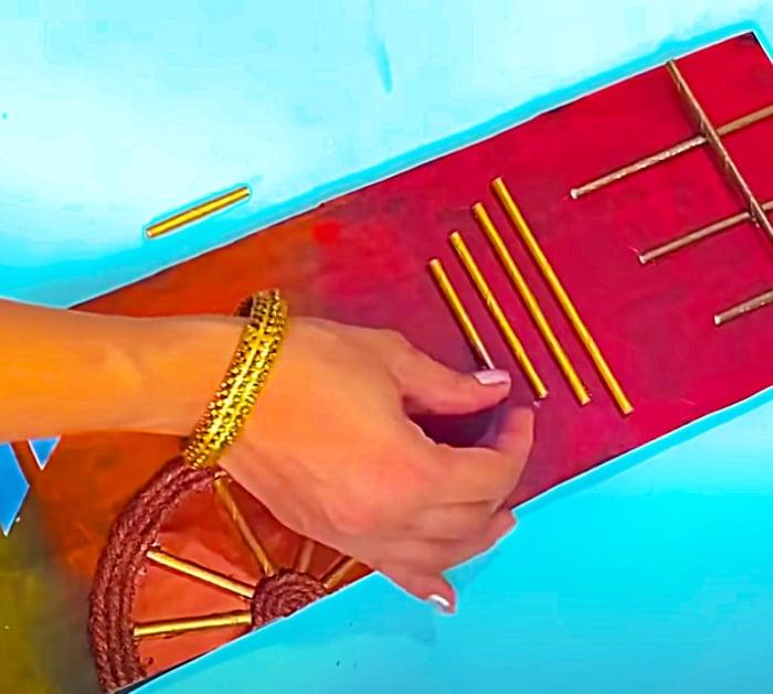 Use A Hot Glue Gun To Make Wall Art Plaques