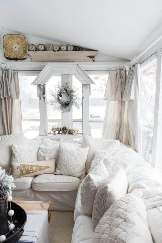 Cozy White Pillows, a budget friendly way to update the space and a creative way to reuse what you already have