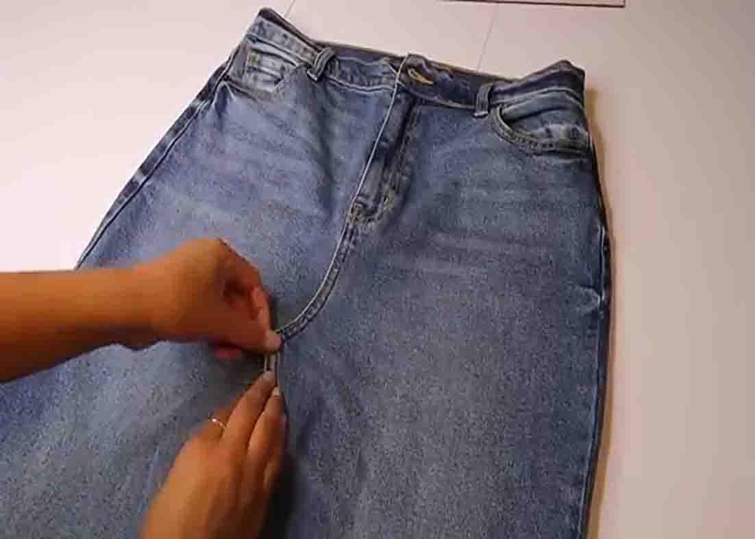 Finishing the maxi skirt by stitching the front closed.