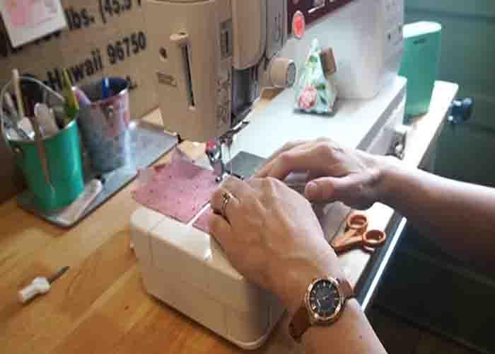 Sewing the four-patch units to make the gingham quilt